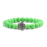 Margarida - Pulseira com estampa de patas decorada com miçangas.