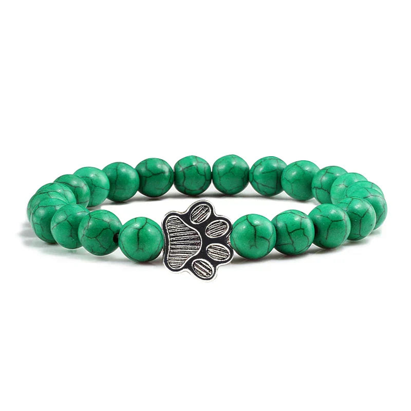 Margarida - Pulseira com estampa de patas decorada com miçangas.