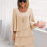 Elsa – Vestido elegante e fluido com volantes