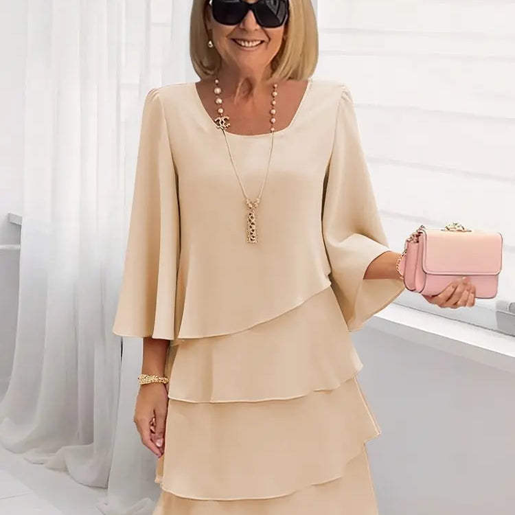 Elsa – Vestido elegante e fluido com volantes