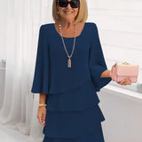 Elsa – Vestido elegante e fluido com volantes