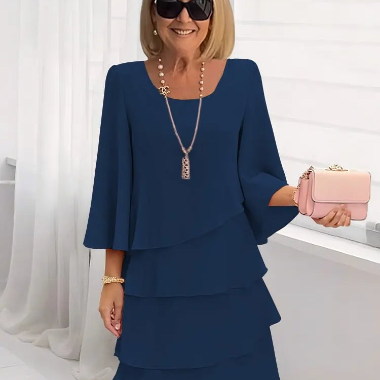 Elsa – Vestido elegante e fluido com volantes