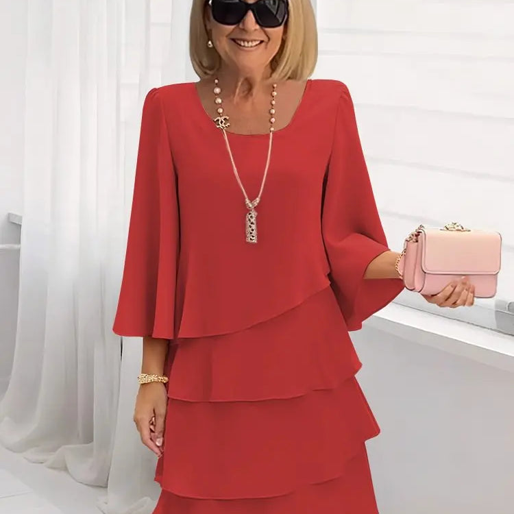 Elsa – Vestido elegante e fluido com volantes
