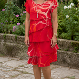 Cristina – Vestido elegante e fluido com volantes