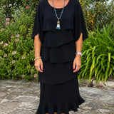 Sofia – Vestido elegante e fluido com volantes
