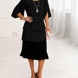 Sofia – Vestido elegante e fluido com volantes