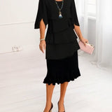 Sofia – Vestido elegante e fluido com volantes